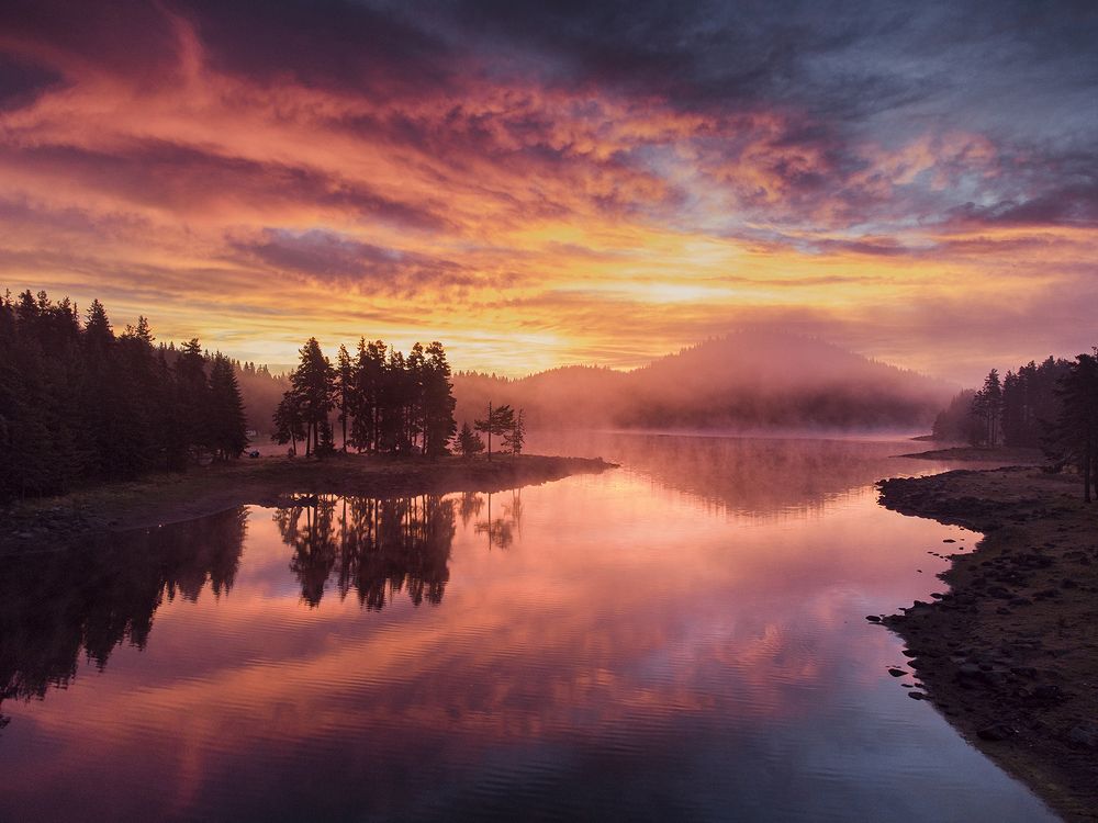 The photo was taken with a drone, albeit from a low height. I have the original file, and besides, it appears that the coast was photographed not from the ground, but from a certain height. This is in the category "Aerial Photography"