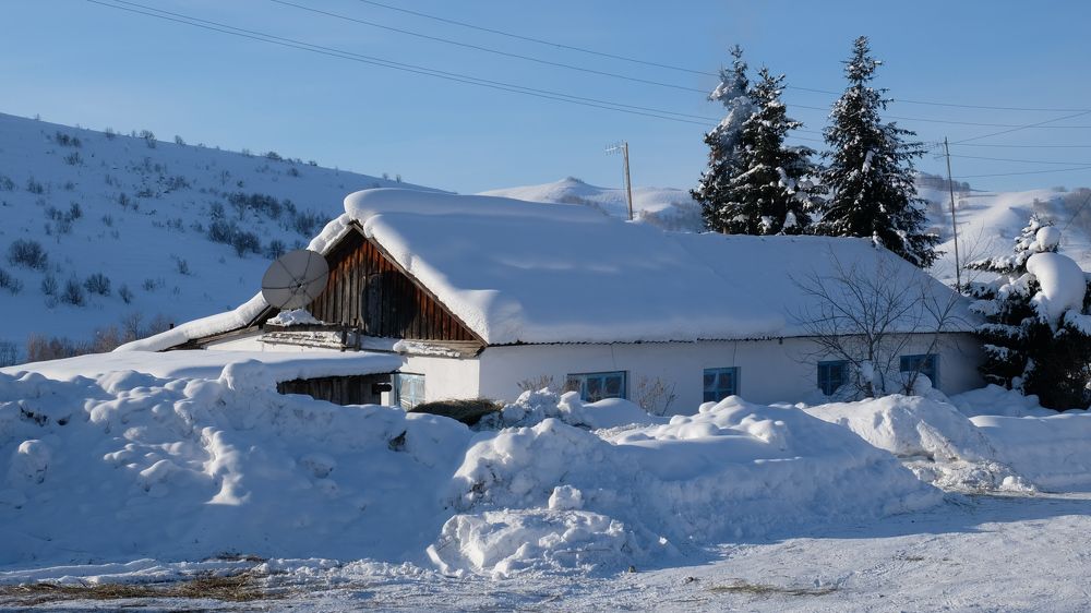 Дом в снежной шубке