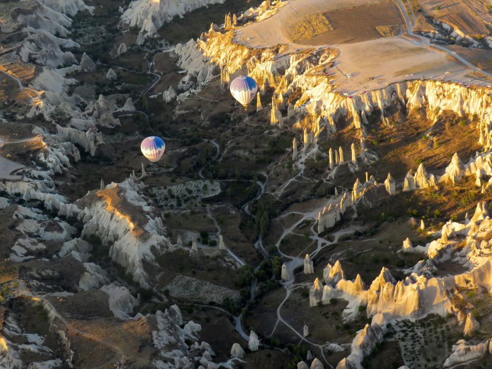 Unusual landscape of Cappadocia and hot air balloons
