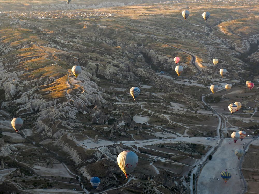 Unusual landscape of Cappadocia and hot air balloons