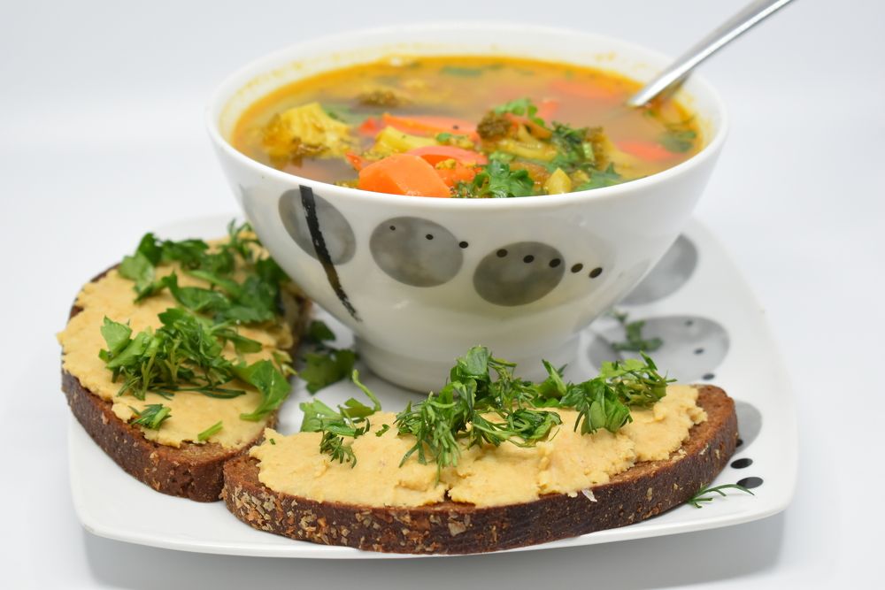 Vegetable soup and hummus sandwiches