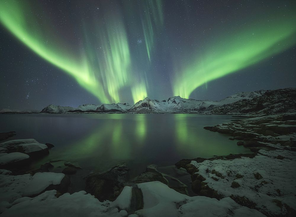 Aurora over jagged ice