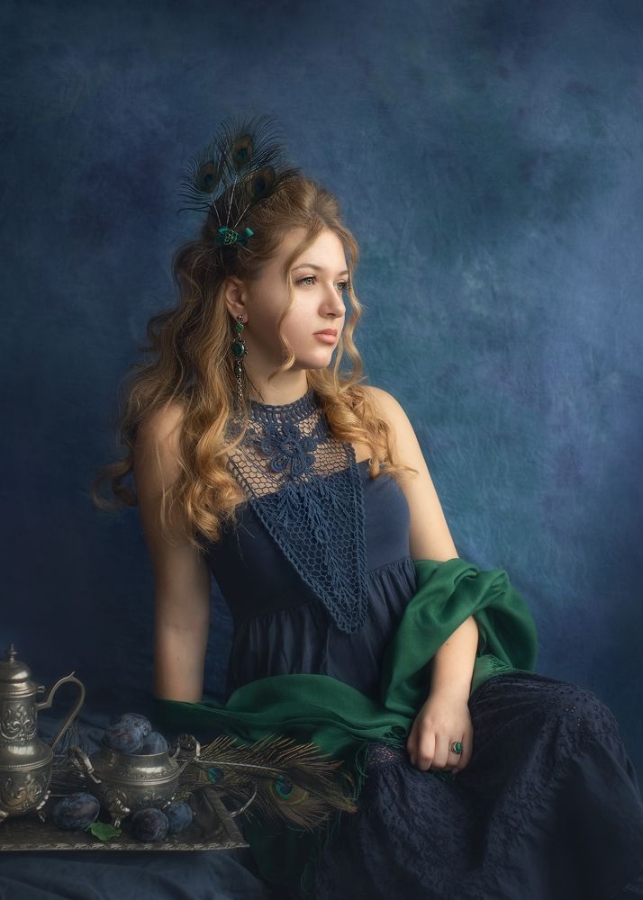 Girl with a peacock feather