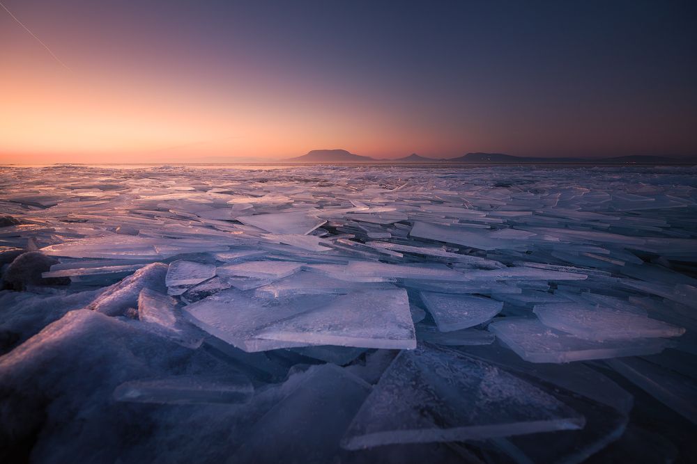 Broken Waves on a Frozen Sunset