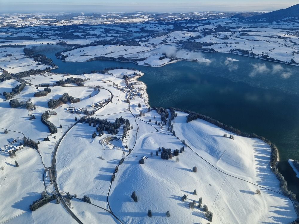 Lake surrounded with snow