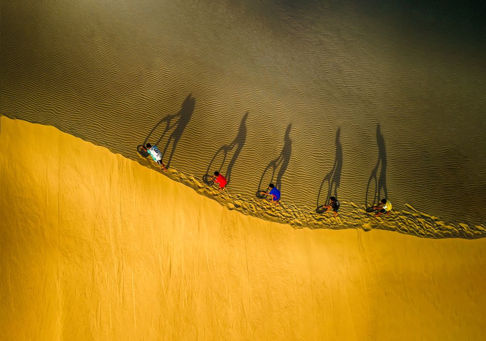 Rolling tires on the sand dune