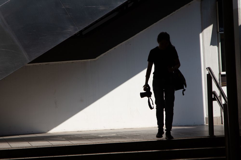Beautiful photographer in silhouette