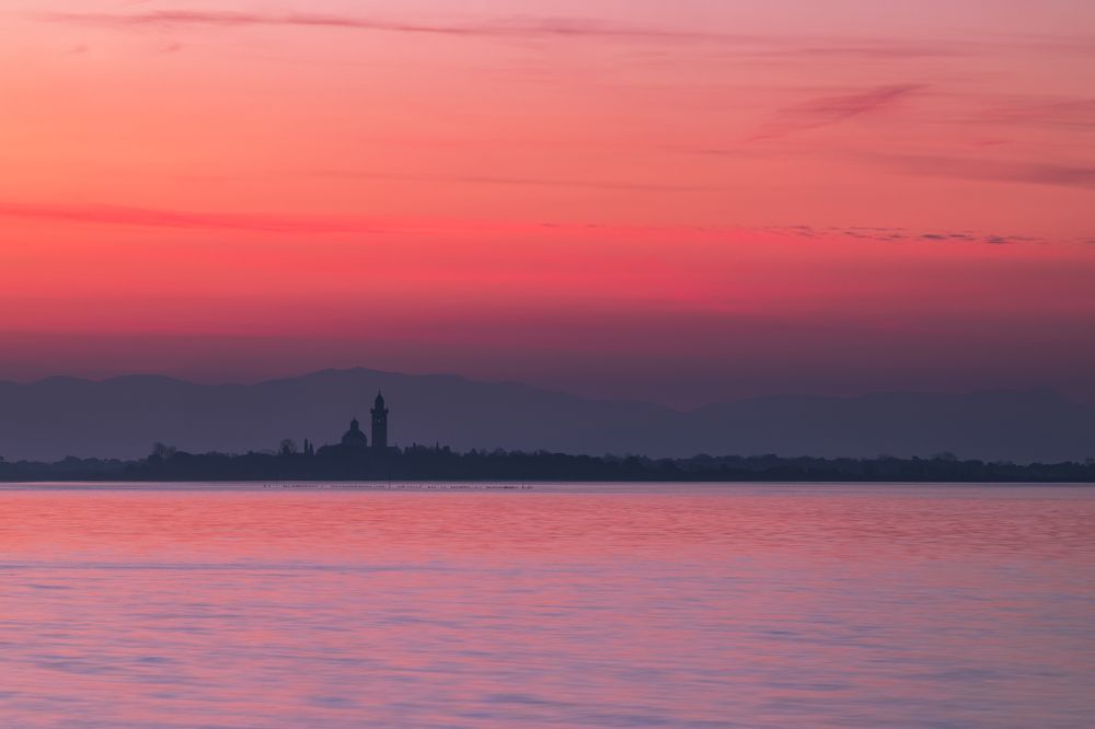 Sunrise at the Sea and a Church