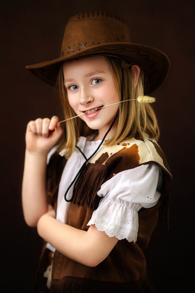 Girl with a blade of grass