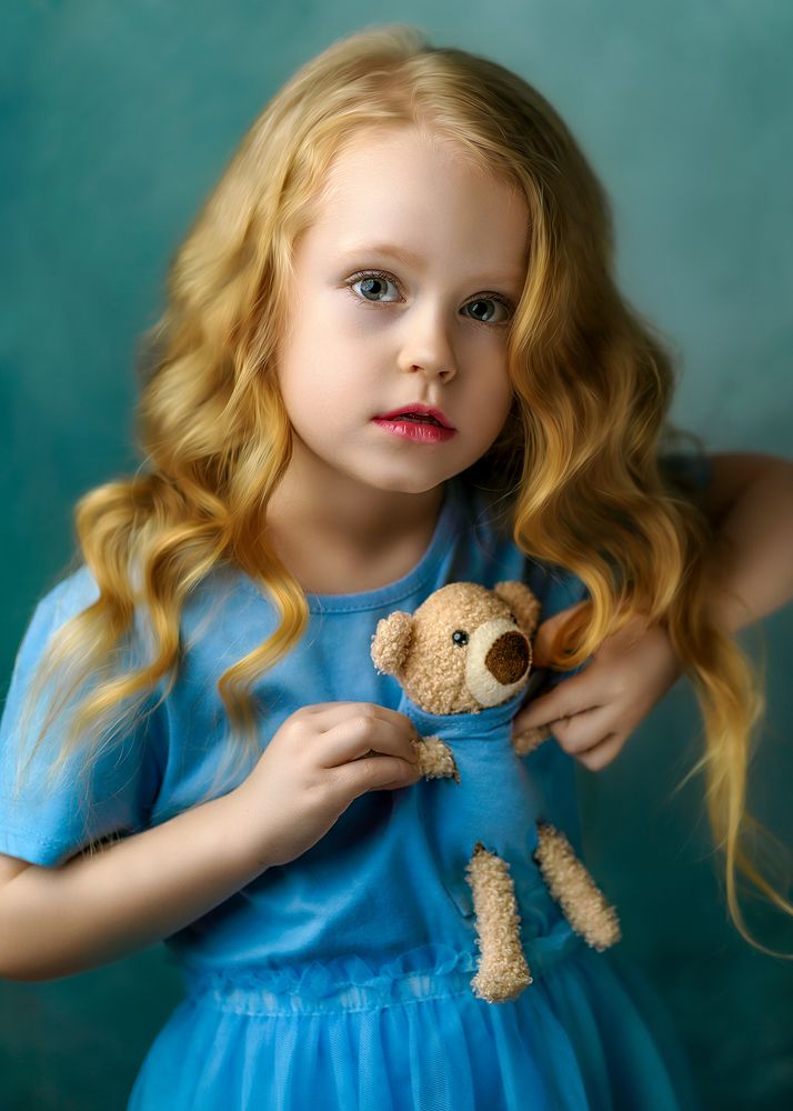 Girl with a teddy bear