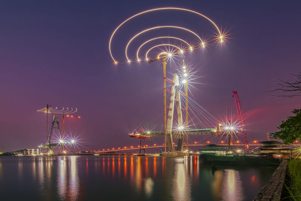 Construction of cable-stayed bridge at night
