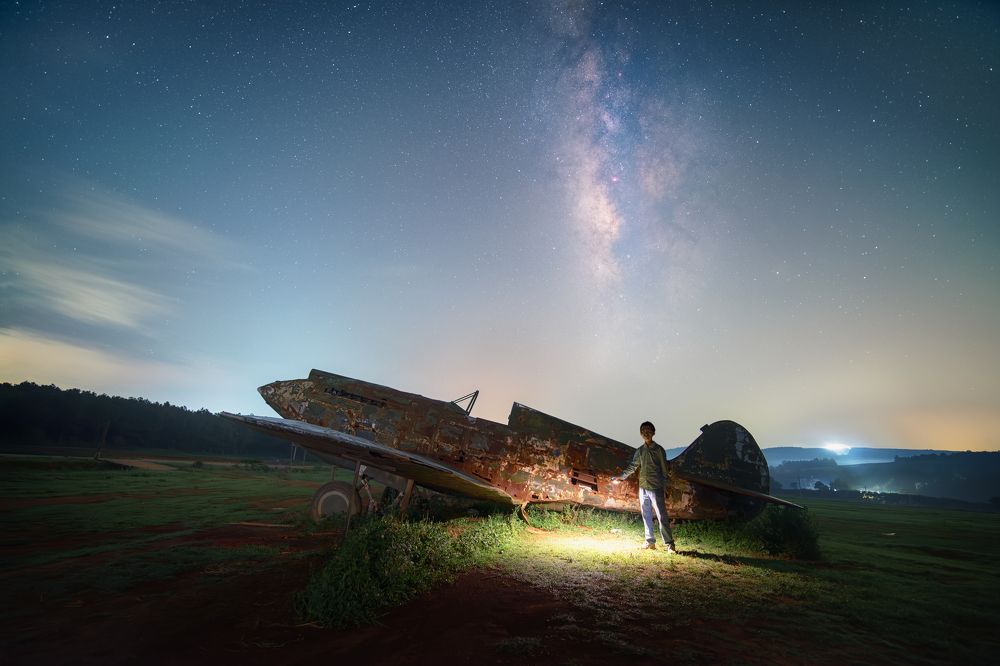 Plane under the Milky Way