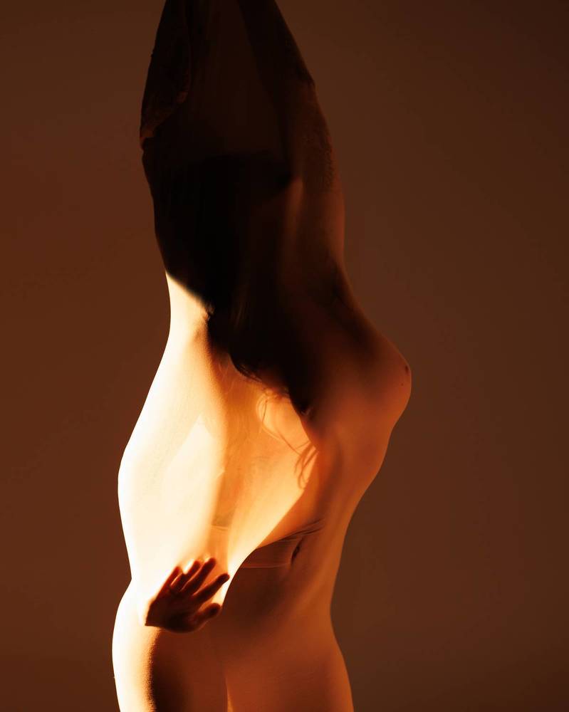 Bearing light in hues of sunrise