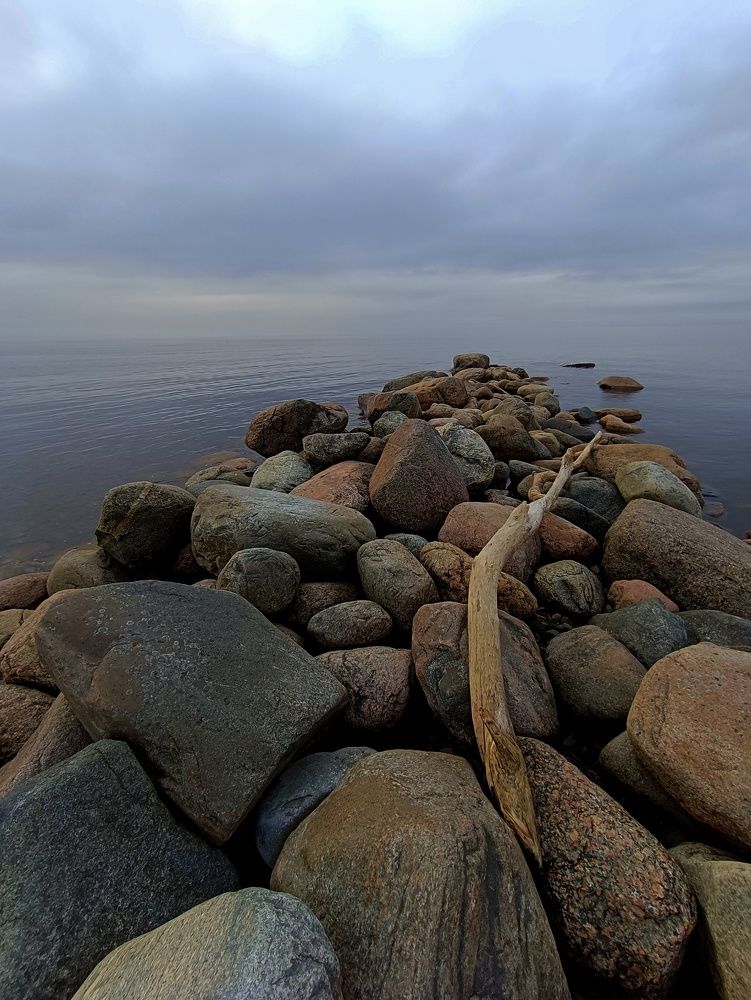 Stone road into sea.