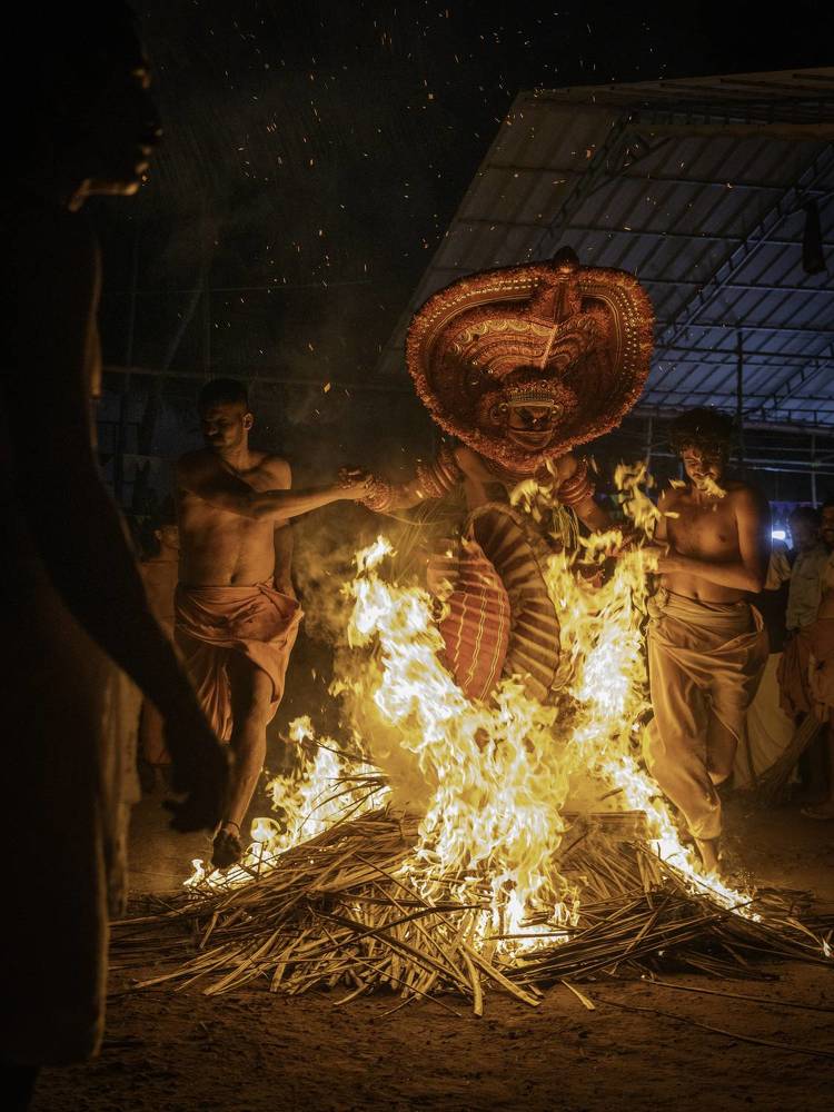 Embracing the Flames: Capturing the Power of Kandanar Kelan Theyyam
