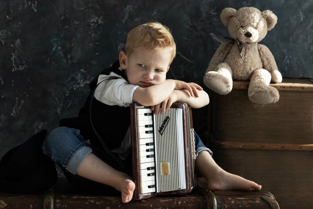 Маленький гармонист.