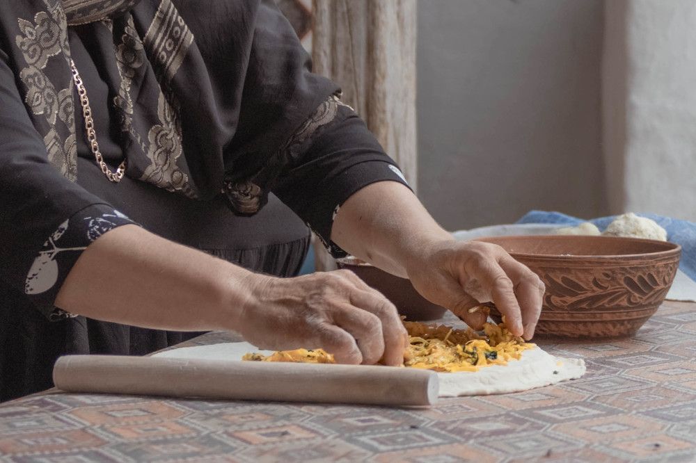 Изготовление национальных лепешек чуду