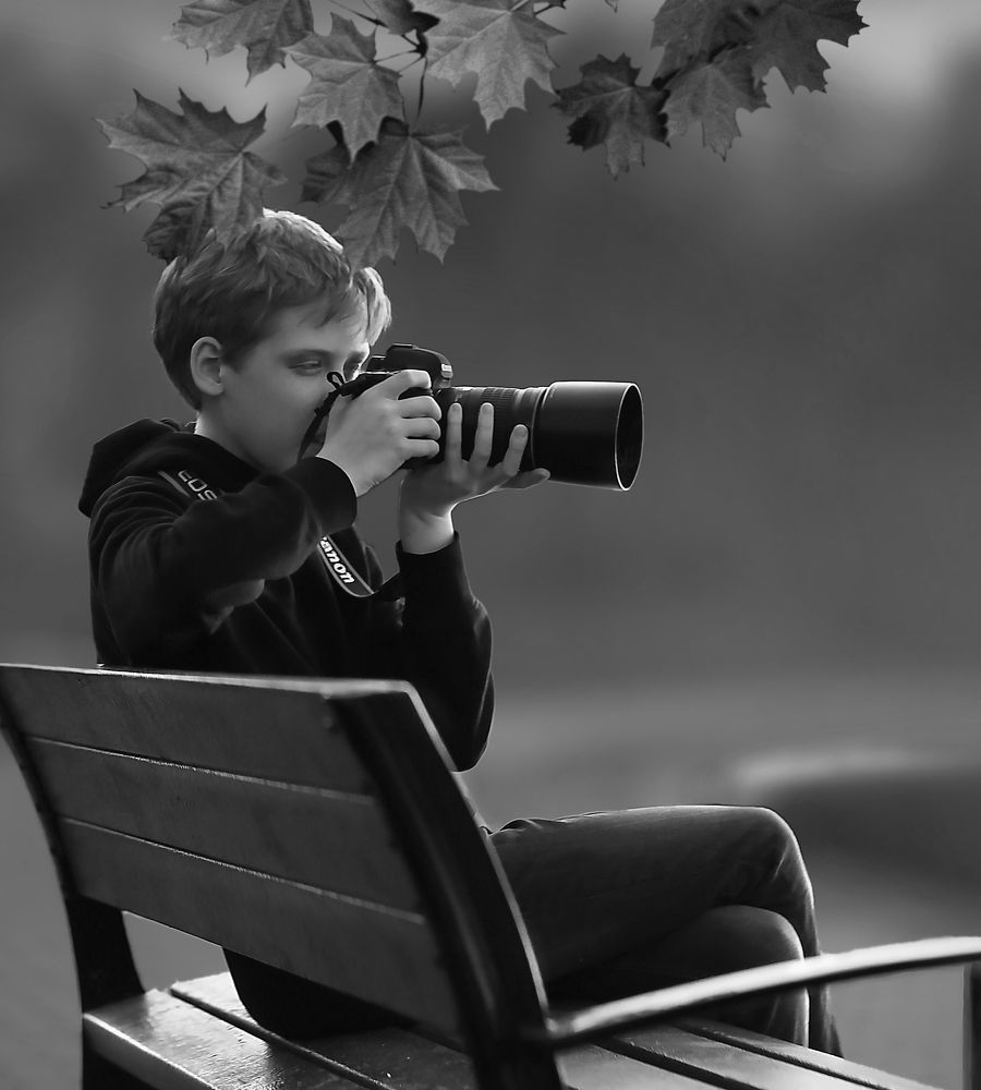 Мальчик с фотоаппаратом