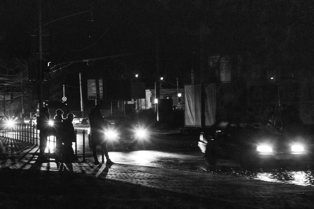 Only headlamps of cars light. Blackout