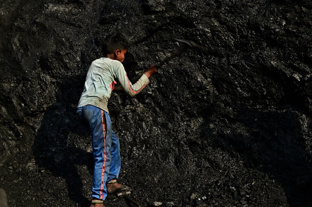 LOST CHILDHOOD IN THE DESPERATE STRUGGLE FOR SURVIVAL.