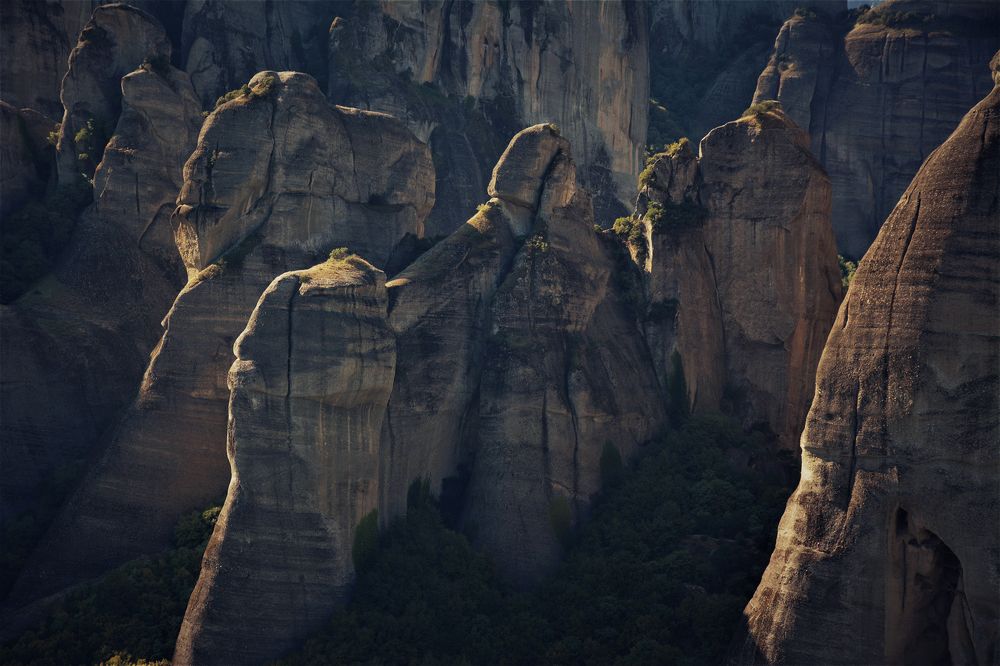 A portrait in stone with black tears