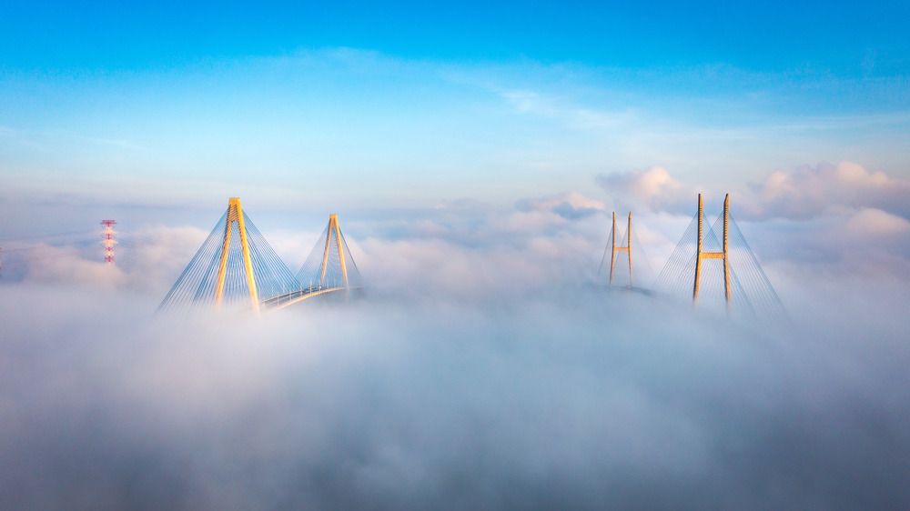 pair of bridges in the clouds