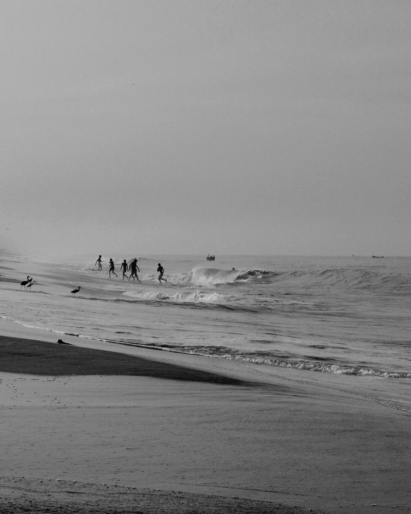 People playing in the beach