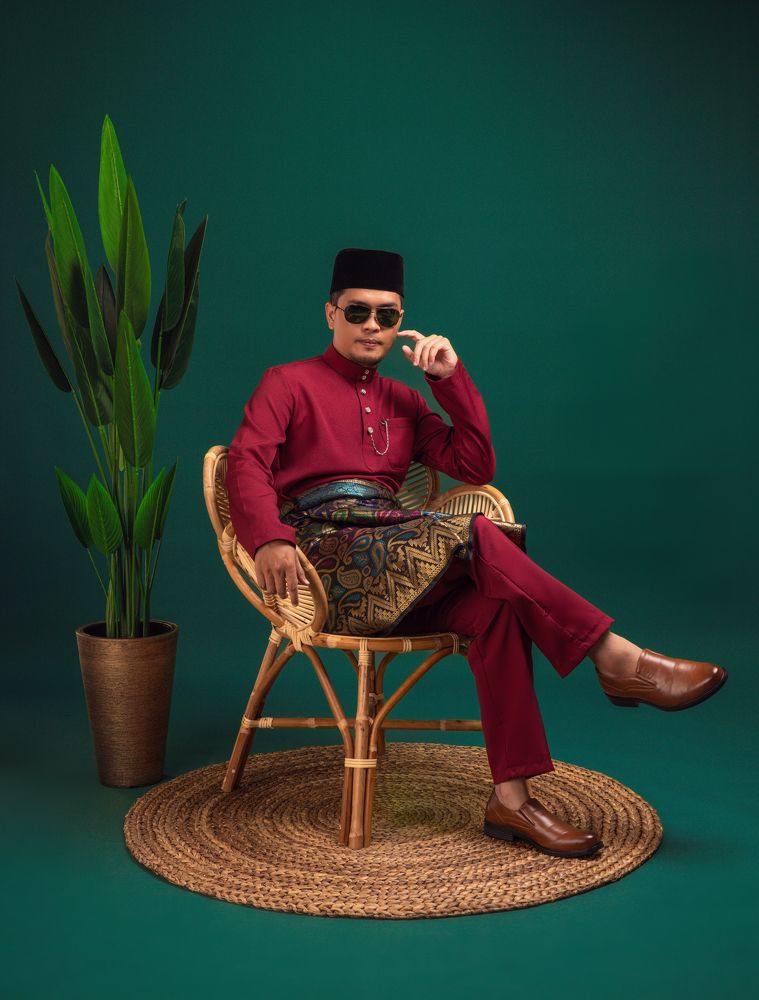 A portrait of a Malaysian man.