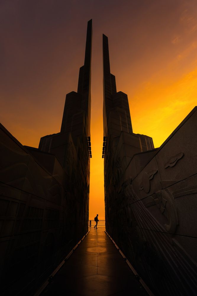 shadow of photographer under monument