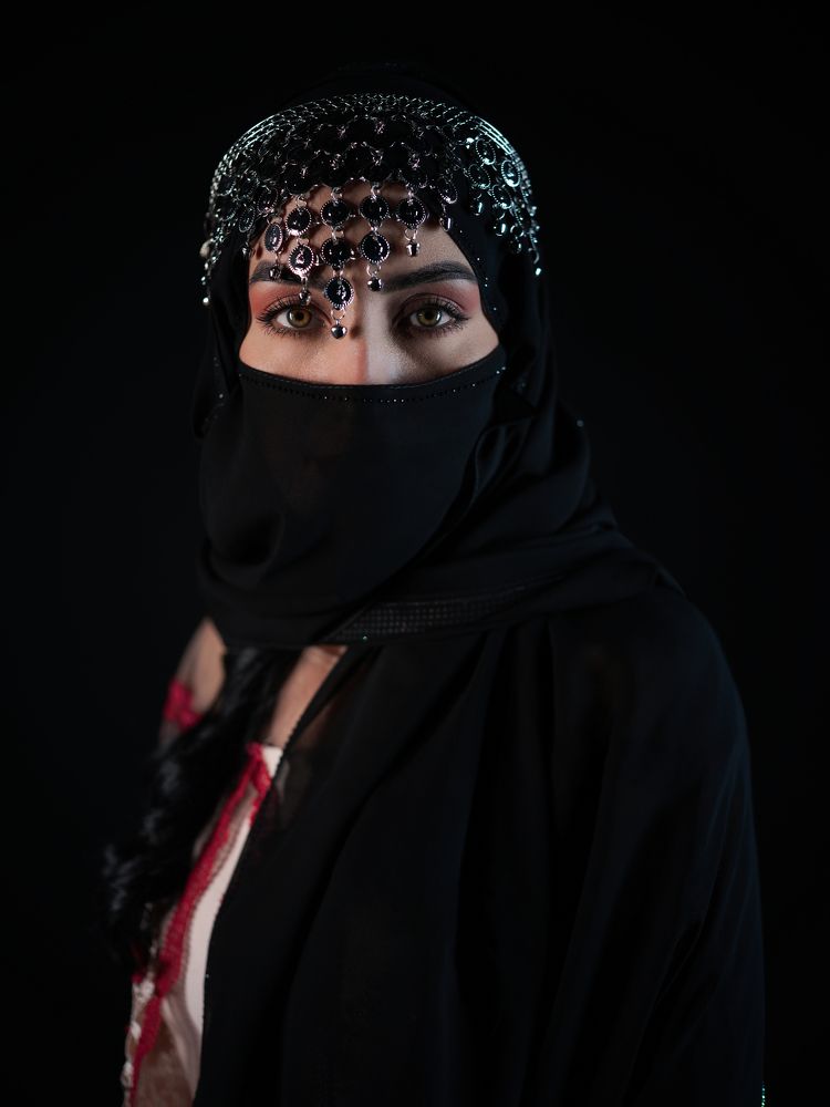 Algerian Woman dressed in traditional clothing.