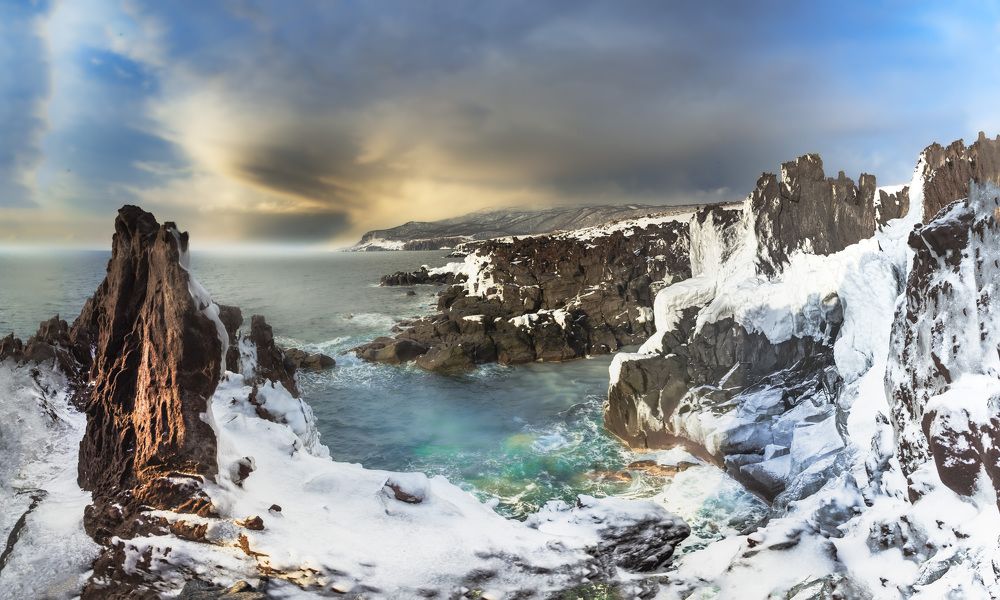 Панорама лавового поля Янкито с видом на вулкан Баранского