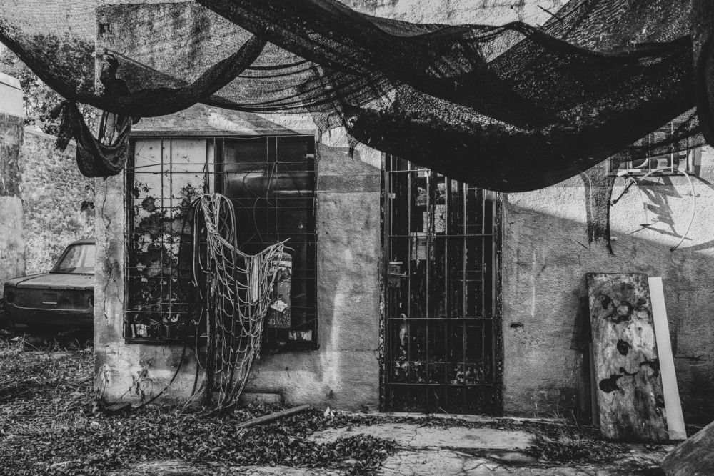 Abandoned service station building