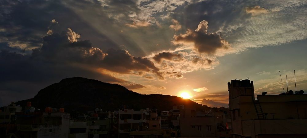 Beam of sunlight shining  through the town