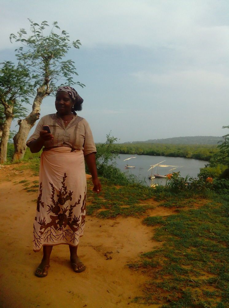 African Mama westernized and enthusiastic on the phone