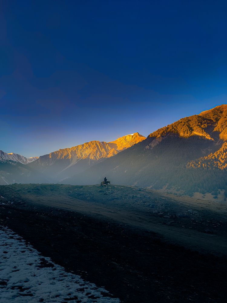 Basking in the warm embrace of mountain twilight