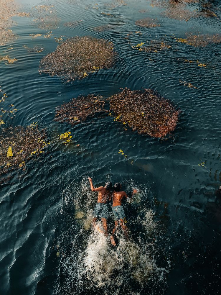 Embracing the joys of childhood: A carefree spirit makes a splash in the water