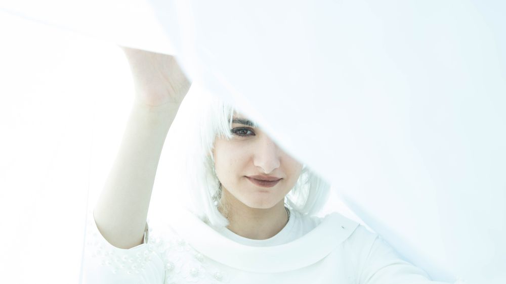 A woman in white
