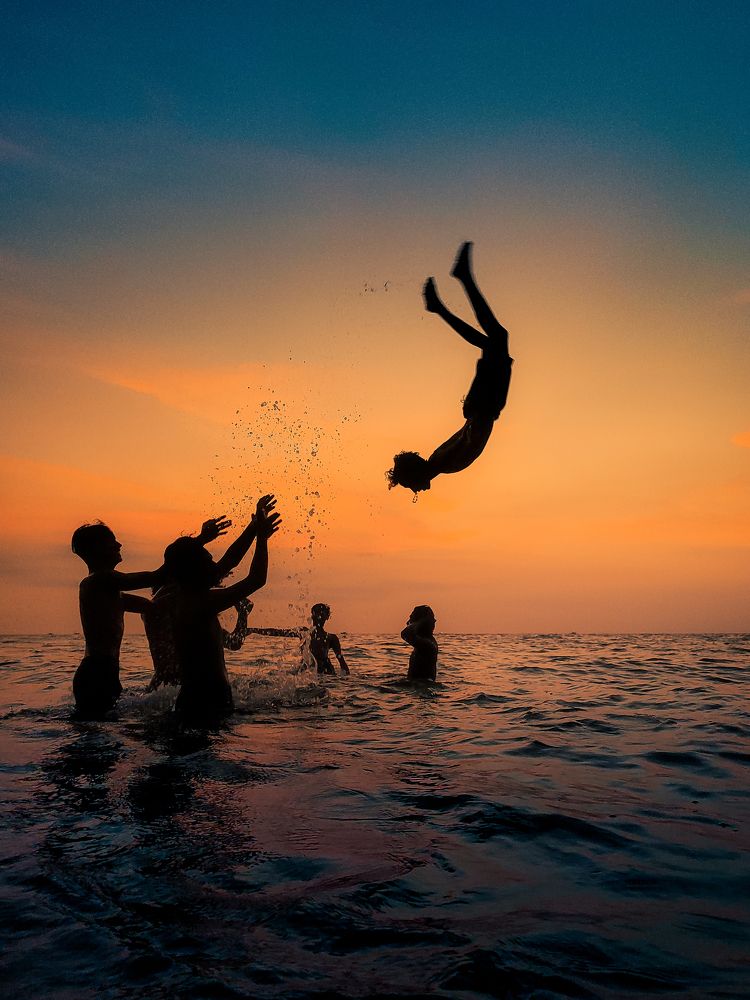 Ocean leaps and boundless joy – defying gravity with every splash.