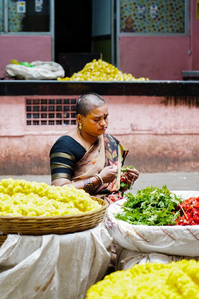 Portrait of a lady flower seller.