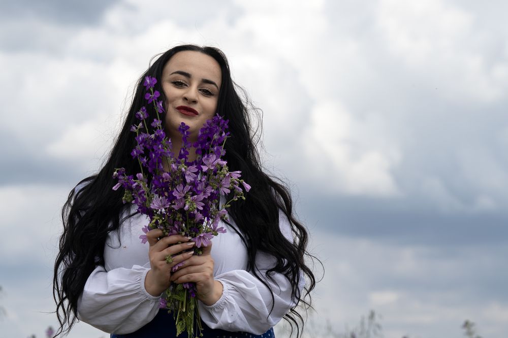 Girl and Purple Flowers