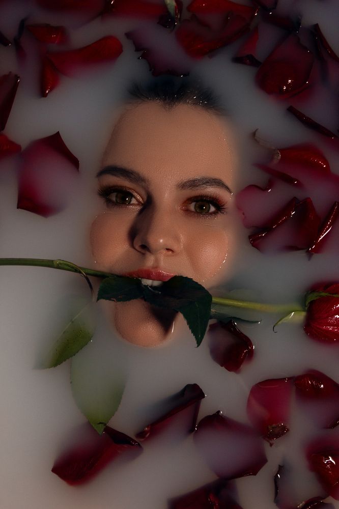 Lady in the bathroom with roses