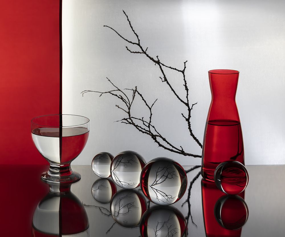 Red vase and glass balls