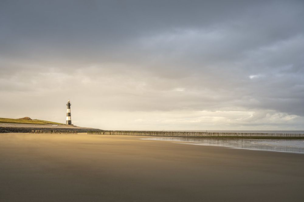 Fine Art Landscape of the Lighthouse of Breskens during sunrise.