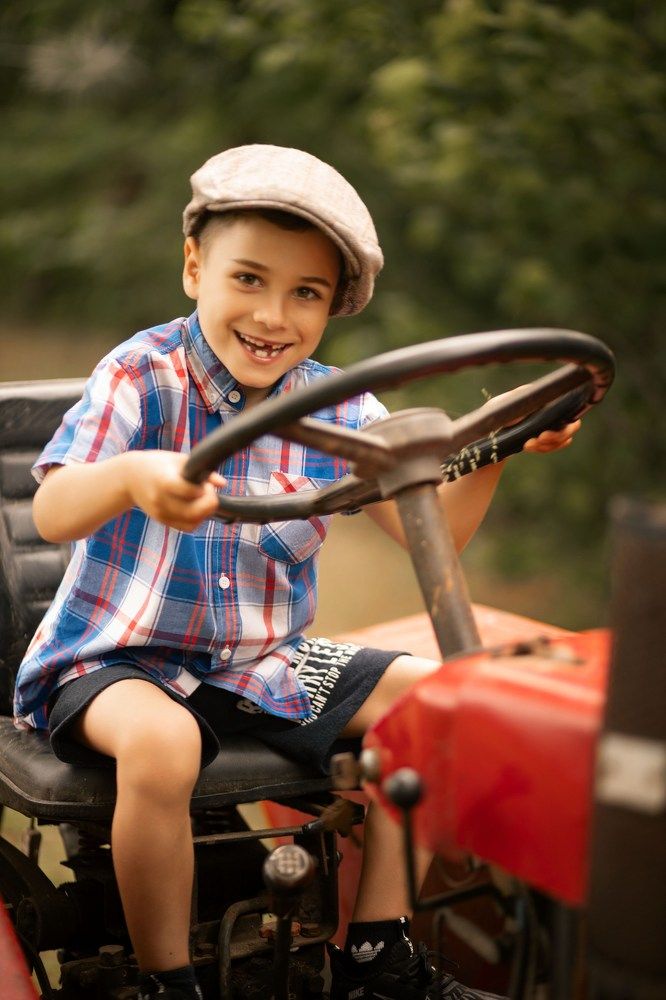A young tractor driver