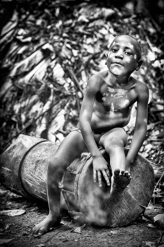 A YOUNG CHARMING MUSICIAN PYGMEE BAKA