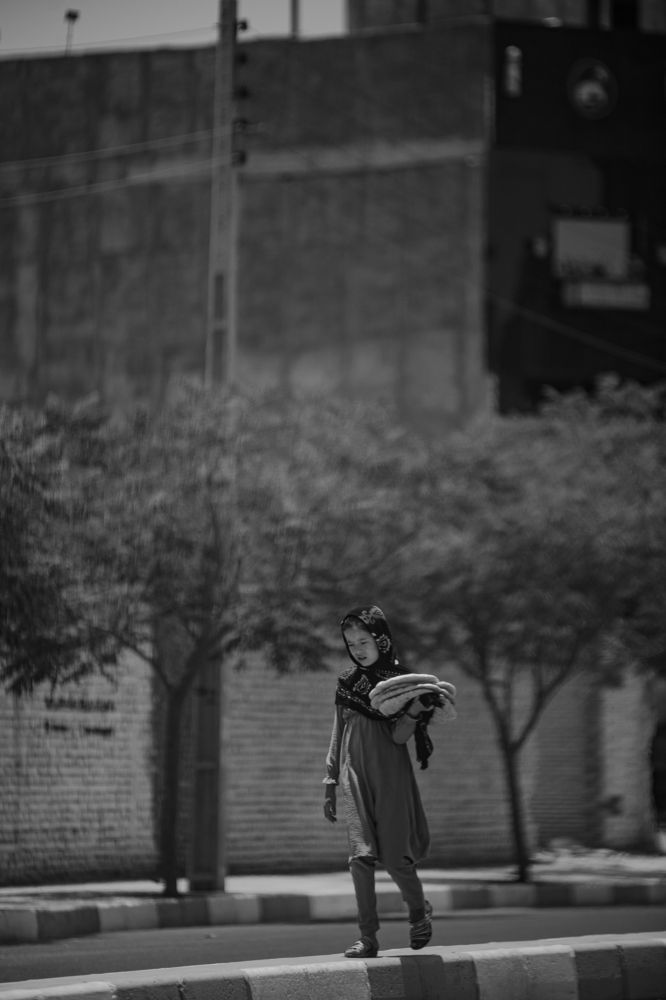 Photograph by Amir Negaresh