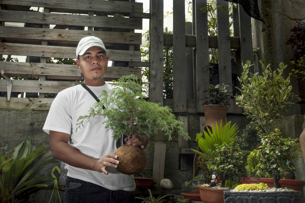 Gardener with cute plant