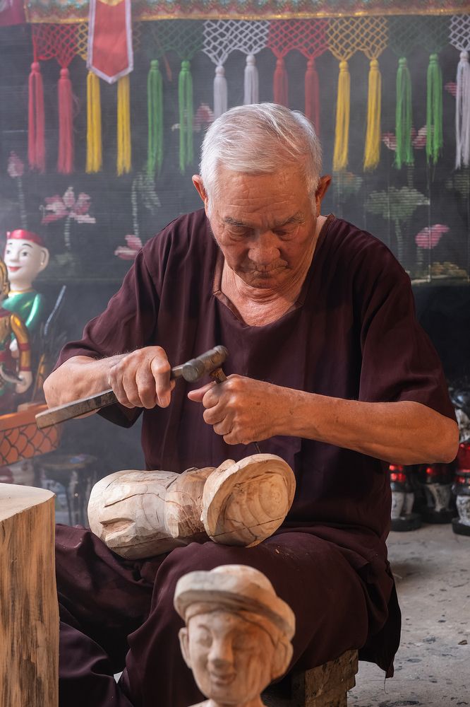 A water puppet master