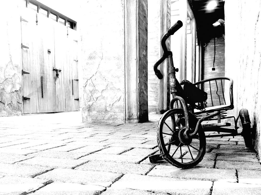A tricycle remembering its owner