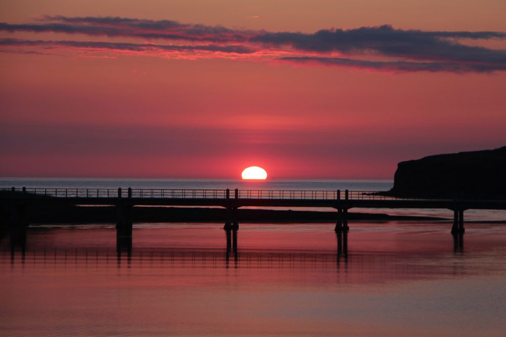 Midnight sun in Vesturós Iceland.